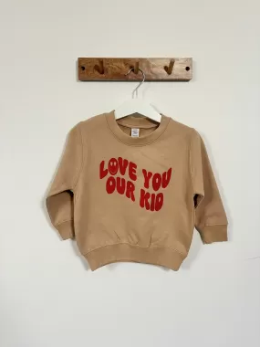 Our Albie ‘Love You Our Kid’ sweatshirt for kids in desert sand